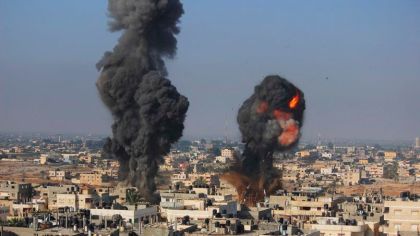 Smoke and flames are seen following what police said was an Israeli air strike in Rafah in Gaza Strip